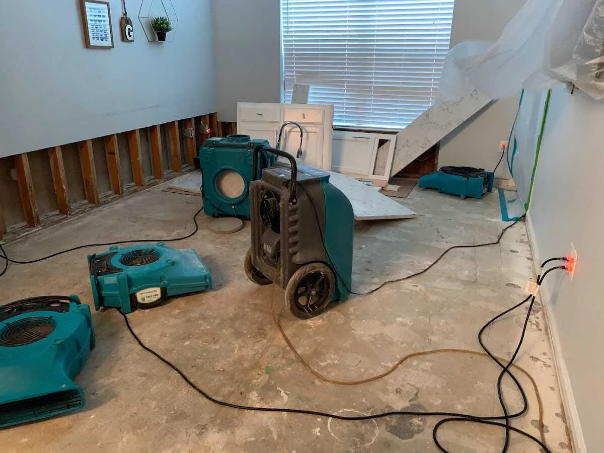 Dehumidifier in flood-cut room for Water Damage Restoration in Parole